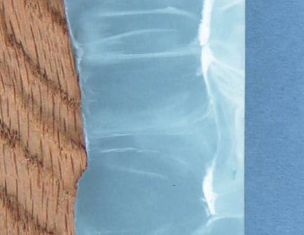 décapsuleur mural bois résine vert volutes